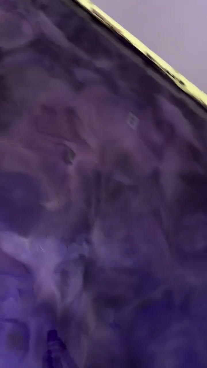 Deep purple metallic epoxy floor coating finished in a master bedroom